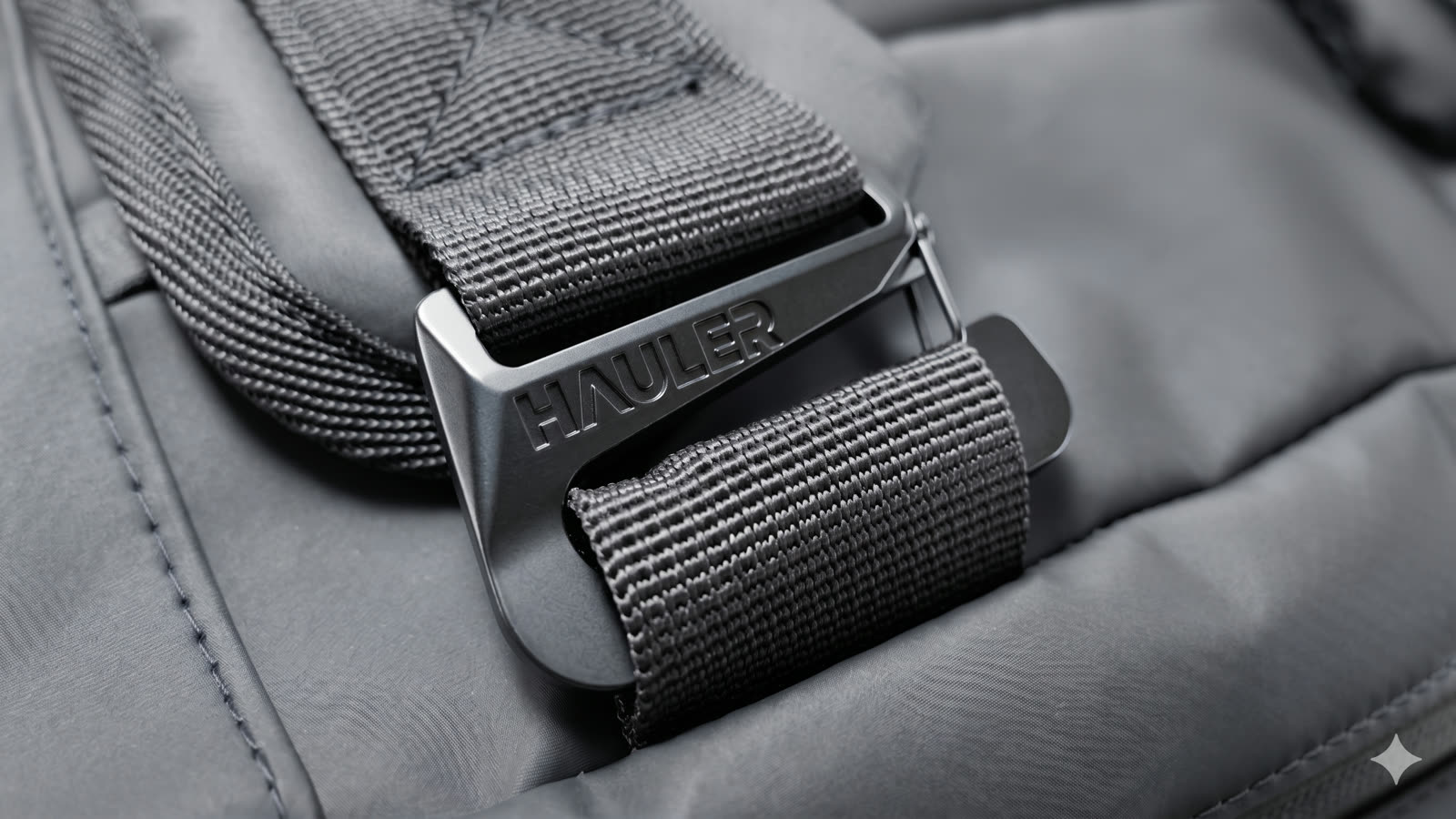 Hauler duffel — material detail, hardware, and zip architecture