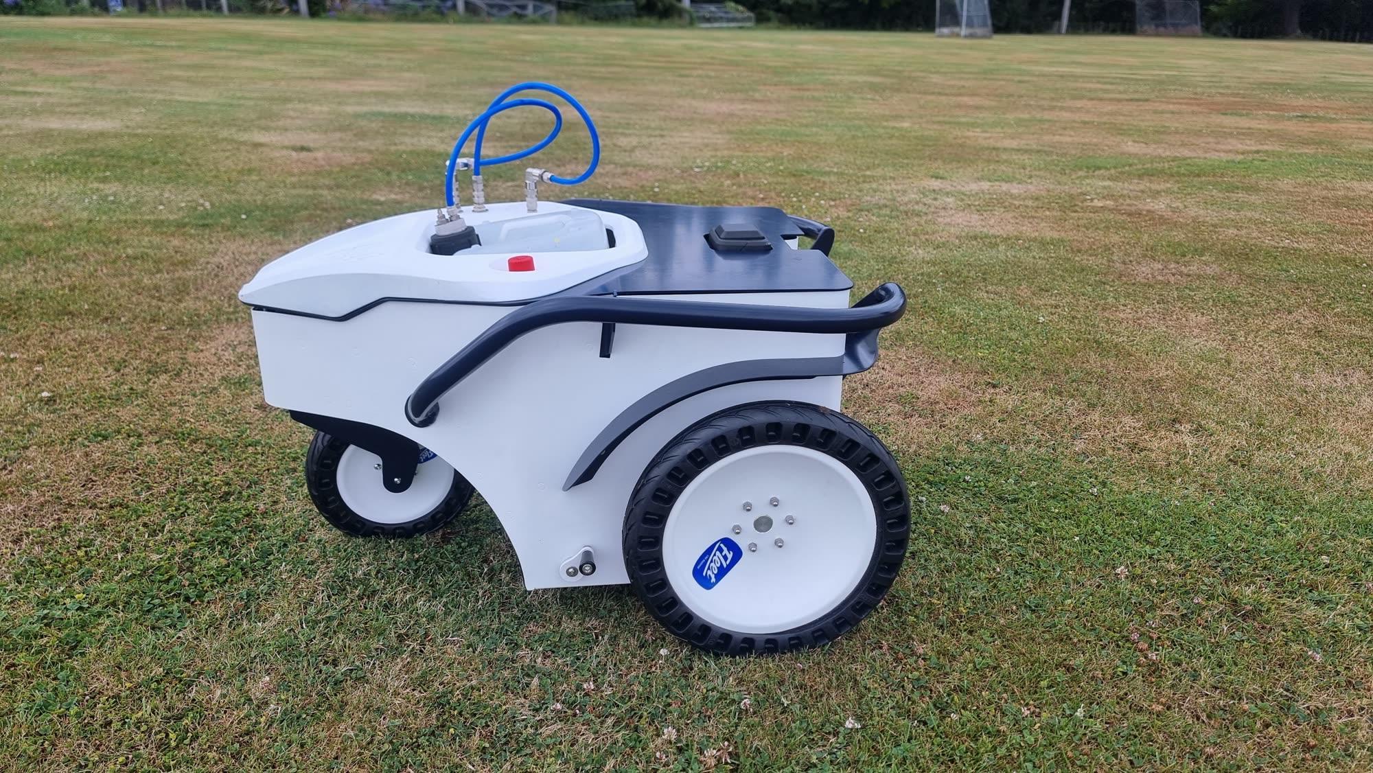 Fleet line marker on a sports field, mid run